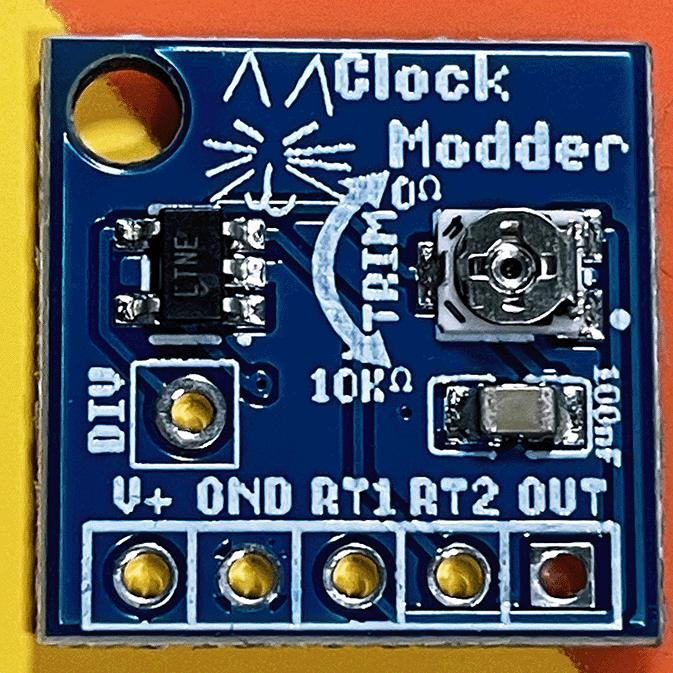Front view of the Clock Modder LTC1799 mod board. A small circuit board in blue.
