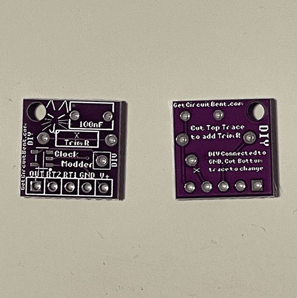 Photo showing the Front and Back of an unpopulated purple PCB for mounting LTC1799 chips.